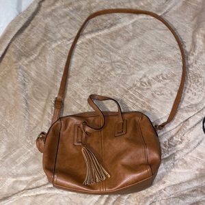 Brown crossbody purse with tassel | includes inside pockets